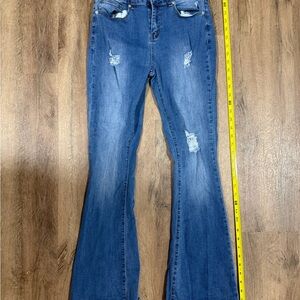 Mid-Rise Distressed Wide-Leg Jeans in Blue